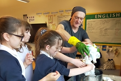 Students at Littleport Community Primary School help to get ‘Eel-izabeth’ ready to celebrate Visit Ely’s Eel Parade